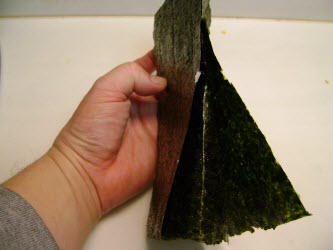 Bending nori back the other way to help break it