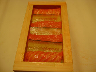 Showing top when salmon and cucumber have been layered