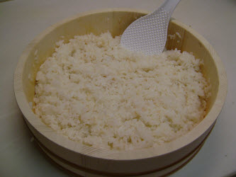 Finished sushi rice in traditional Japanese Hangiri (sushi oke)