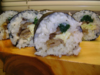 Vegetable futomaki on sushi plate