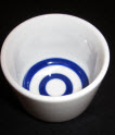 Traditional sake cup with concentric circles in bottom to determine clarity