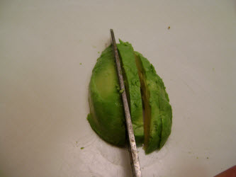 Slicing avocado for california roll