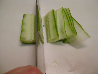 Thinly slicing the japanese or english cucumber