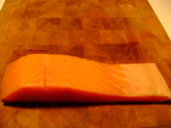 cold smoked salmon on cutting block