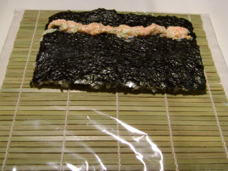 Roe-Mayo Sauce spread over nori for california roll