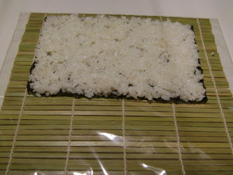 1 cup rice spread on nori for California roll