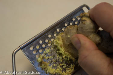 Finely grate 1 teaspoon of ginger for seaweed salad