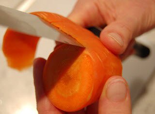 Slicing thin sheets off of vegetables for Katsomuki