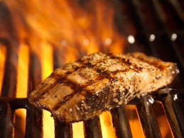 Fish being cooked on the grill