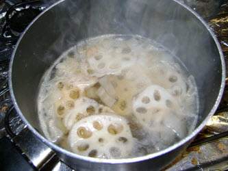 Simmering kampyo, lotus root and abura age...