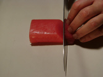 Slicing tuna using a straight cut at a 45 degree angle