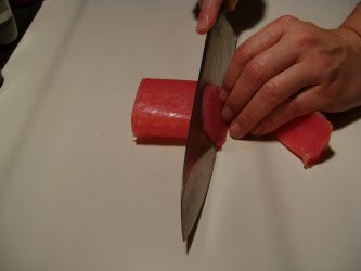 Slicing tuna using a straight cut at a 45 degree angle