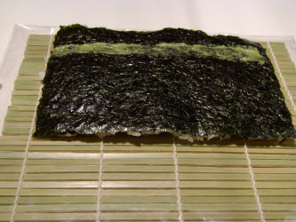 Swipe some wasabi across the nori a little closer to you than centered...