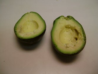 Splitting avocado in half