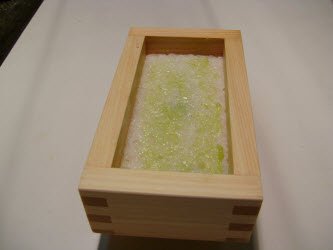 Wasabi spread over 2nd layer of rice